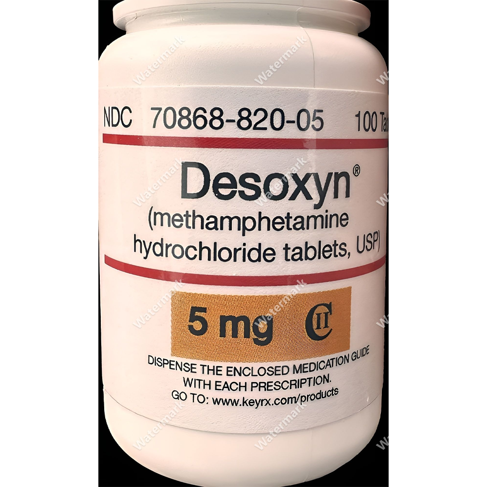 Аптечный флакон лекарства Страттера (Strattera) 40 мг. На этикетке флакона из янтарного стекла указано: Strattera (atomoxetine HCl), 40 mg. 30 Capsules. Rx Only. Внизу виден красный логотип компании Lilly.