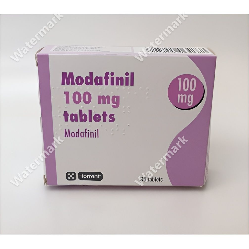 Упаковка Модафинила (Modafinil) в дозировке 100 мг от компании Torrent. Розово-сиреневая картонная коробка, содержащая 30 таблеток. На лицевой стороне четко видна маркировка действующего вещества и дозировки.